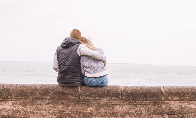 Woman and man on pier