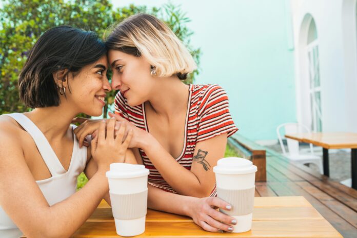 Same-Sex Couple Drinking Coffee Same-Sex Couple Drinking Coffee